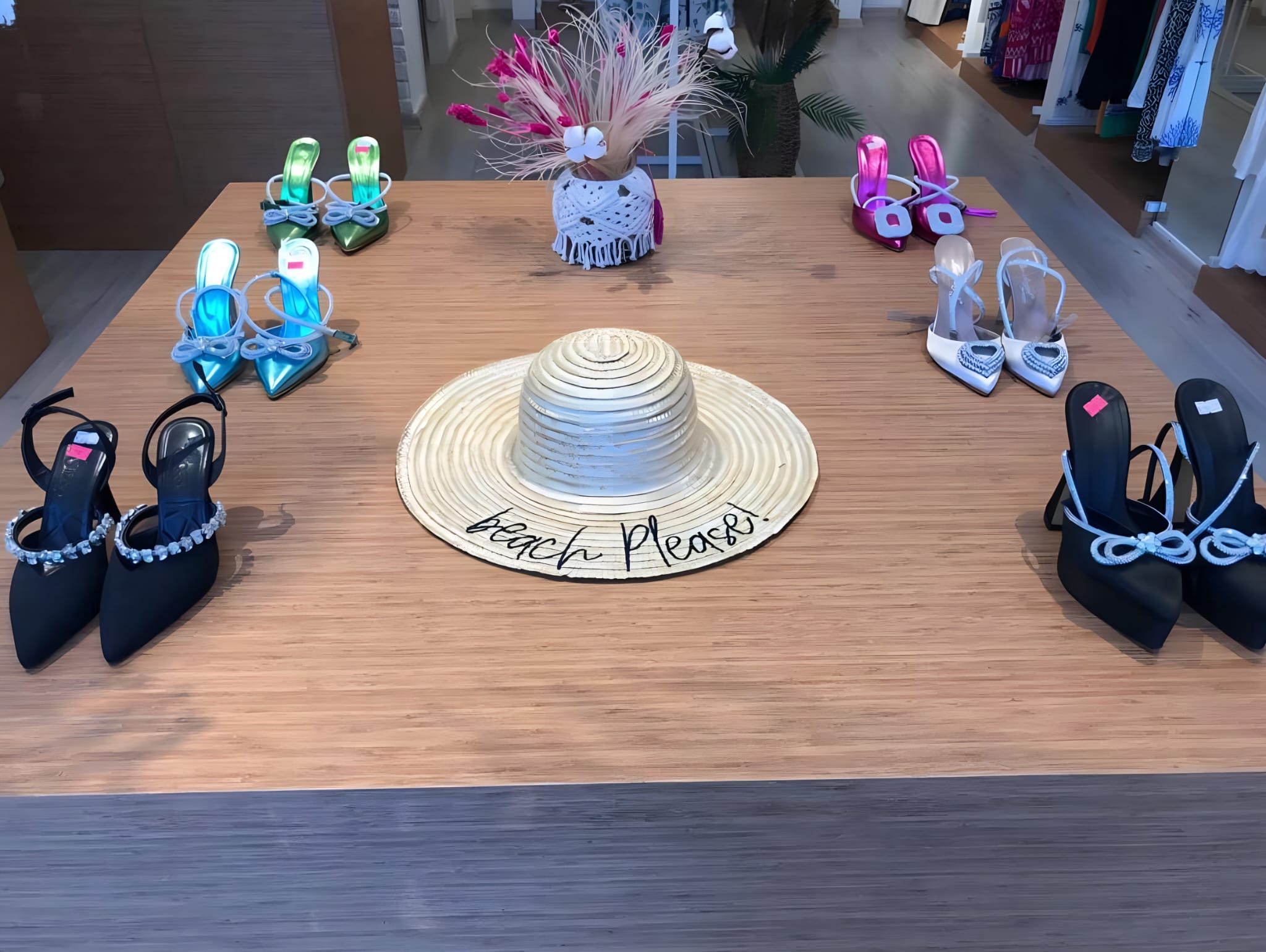 Heels and a sun hat on display